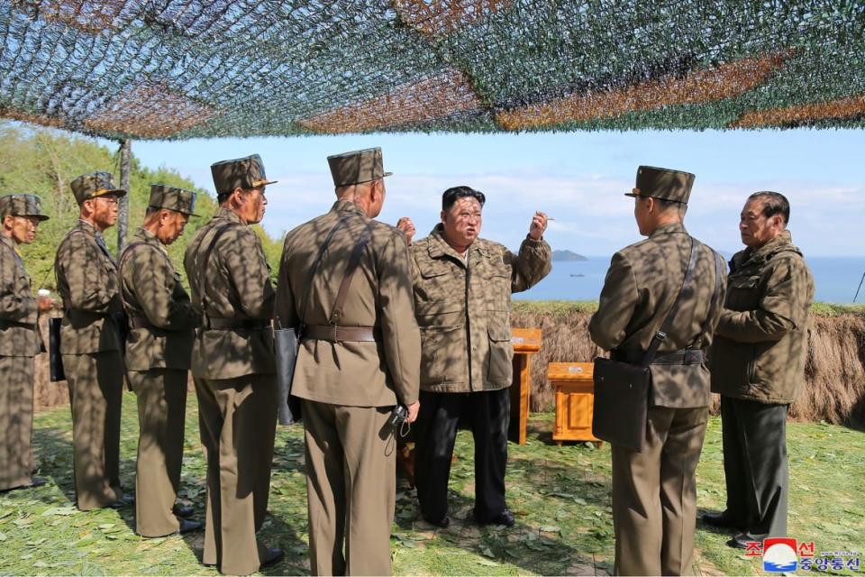 <div class="inline-image__caption"><p>In this photo provided by the North Korean government, Kim Jong Un directs military personnel while inspecting military exercises at an undisclosed location in North Korea.</p></div> <div class="inline-image__credit">Korean Central News Agency/Korea News Service via AP</div>