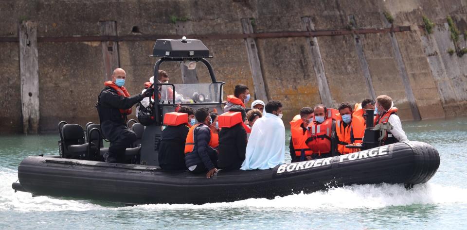 A group of people in a UK border force boat(PA)