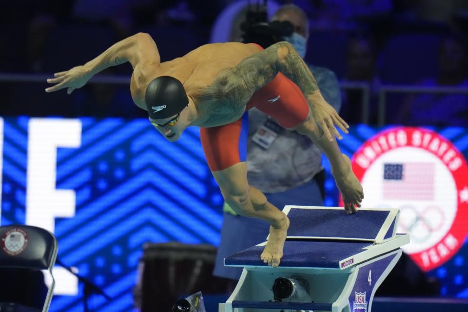 FILE - In this June 20, 2021, file photo, Caeleb Dressel participates in the men's 50 freestyle during wave 2 of the U.S. Olympic Swim Trials in Omaha, Neb. For a man tabbed as swimming’s next superstar, Dressel could not be more disinterested. Of course, he cares about being fast in the pool. He just is not into anyone else’s expectations or comparisons. Fame is not his thing, either. (AP Photo/Jeff Roberson, File)