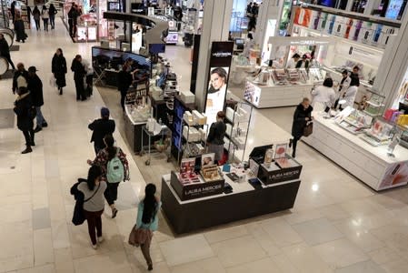 FILE PHOTO: FILE PHOTO: People shop at Macy's Department store in New York