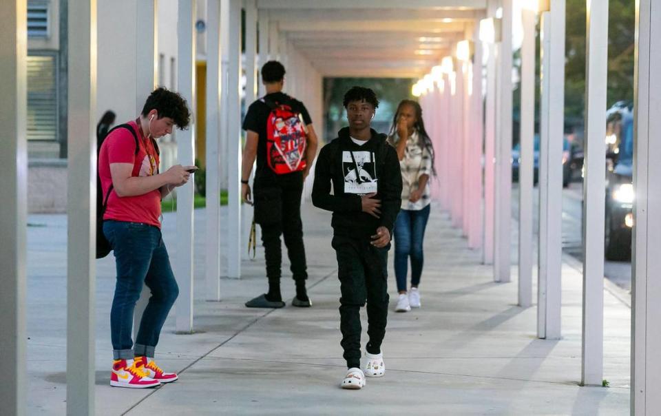 Dane Pryce, 16, center, a junior at Coral Glades High School in Coral Springs, is dropped off during the first day of school in Broward County on Tuesday, Aug. 16, 2022.