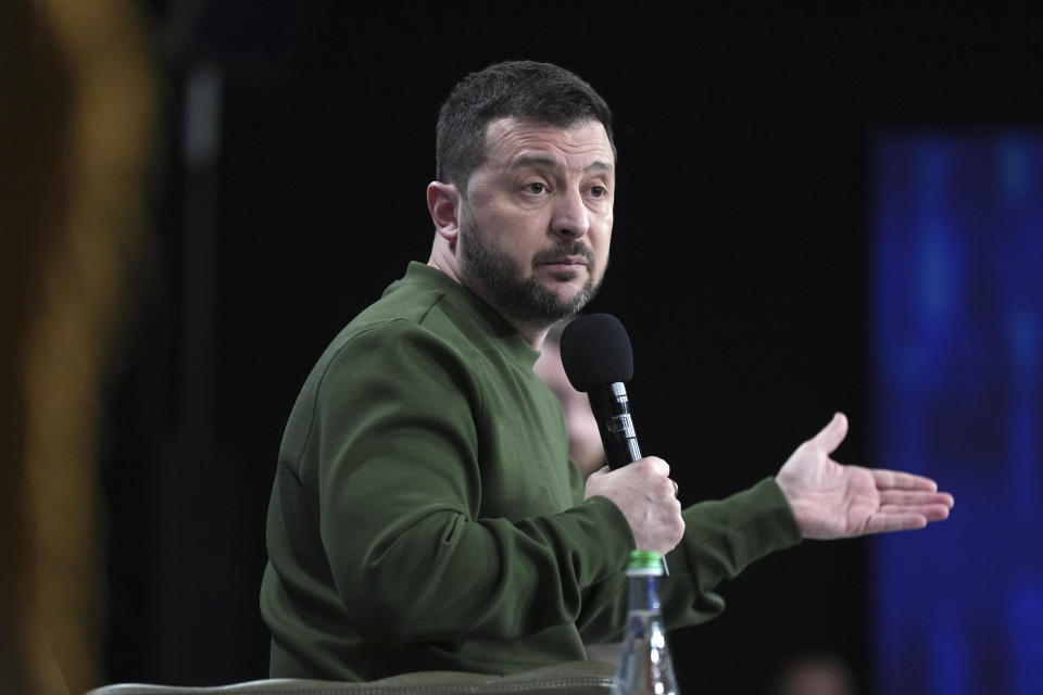 Ukrainian President Volodymyr Zelenskyy answers media questions during his press conference in Kyiv, Ukraine, Sunday Feb. 25, 2024. (AP Photo/Evgeniy Maloletka)