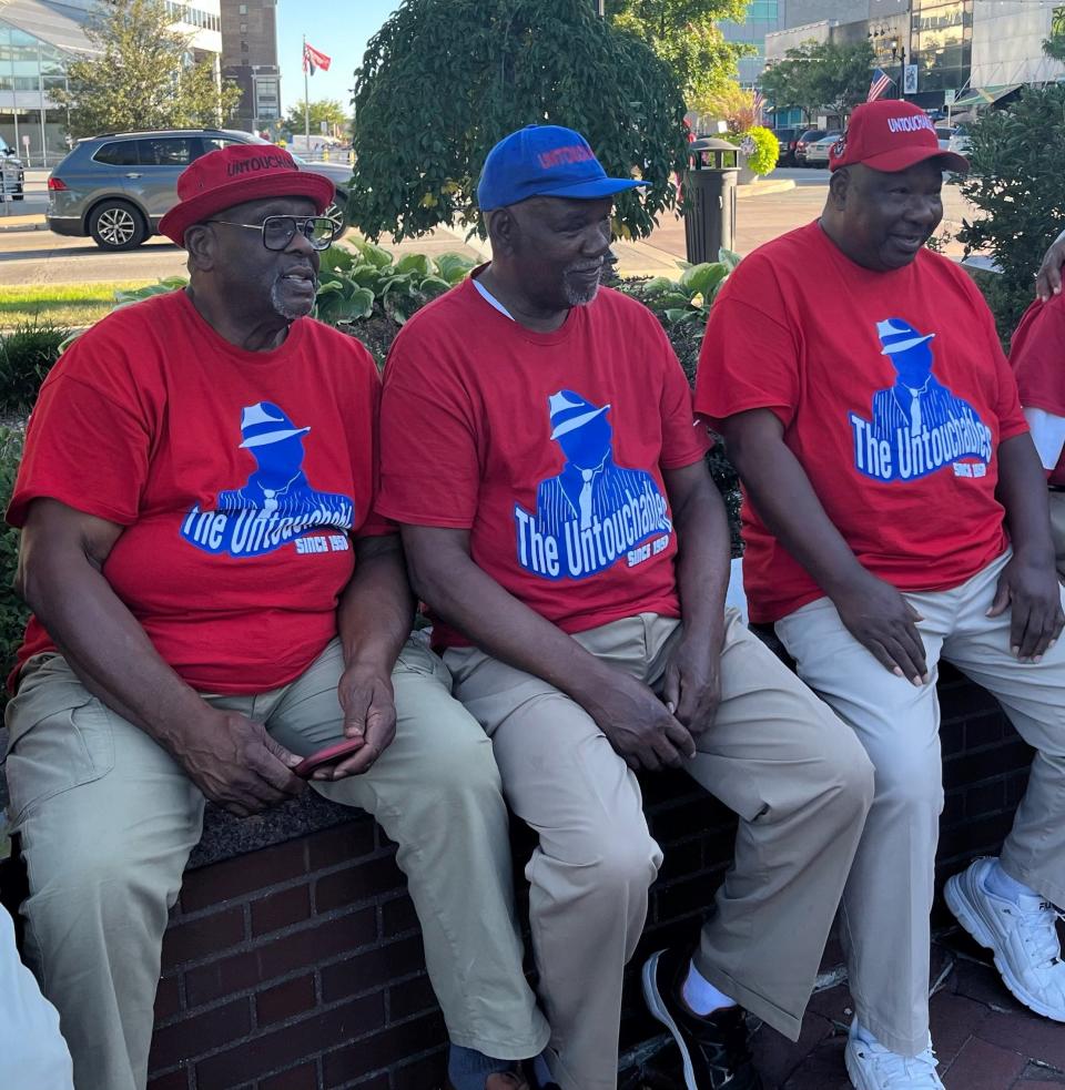 Former NBA player Ted McClain (center) with Harry Gilmore (l) and Willie Southall (r) after Tennessee State's pep rally in downtown South Bend, Ind., on Sept. 1, 2023. The former Tennessee State student-athletes are part of a volunteer group called The Untouchables that attends every Tigers football game, home and away.