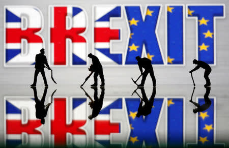 Small toy figures are seen in front of a Brexit logo in this illustration picture, March 30, 2019. REUTERS/Dado Ruvic/Illustration