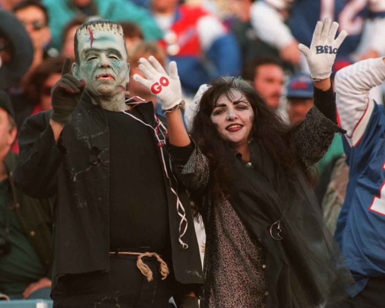 TWO BUFFALO BILLS FANS ARE IN THE HALLOWEEN SPIRIT DURING THE CHIEFS VS BILLS GAME AT RICH STADIUM IN ORCHARD PARK, NY