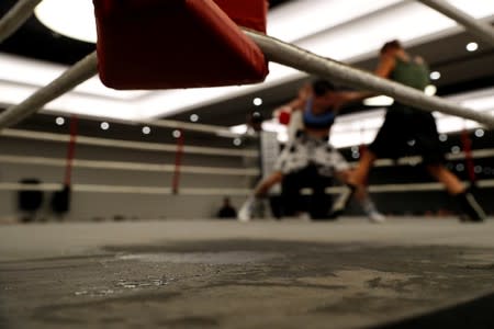 Miriam Gutierrez "La Reina", 36, punches Bianka Nagy during a boxing match in Barcelona