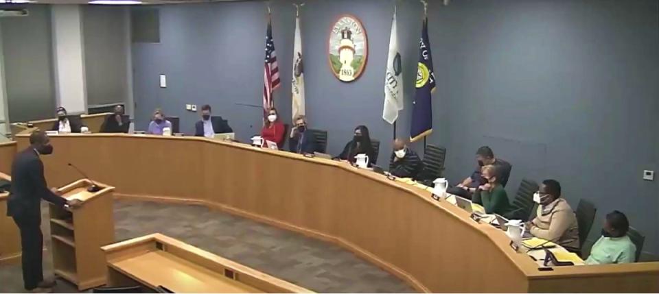 Evanston Health and Human Services Director Ike Ogbo addresses the Evanston City Council during a discussion of an expansion of the city's vaccination-or-testing requirement at Monday's meeting. (City of Evanston/via video)