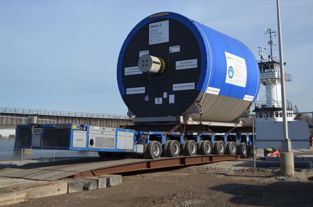 A Yankee dryer is unloaded off a barge Friday at Georgia-Pacific's Broadway Mill in Green Bay. The equipment, made by Valmet, left Sweden in October and passed through Milwaukee before arriving in Green Bay.