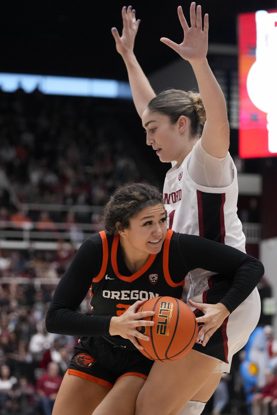 Oregon State guard Talia von Oelhoffen, left, tries to get around Stanford forward Brooke Demetre during the first half of an NCAA college basketball game, Sunday, Jan. 21, 2024, in Stanford, Calif. (AP Photo/Godofredo A. Vásquez)