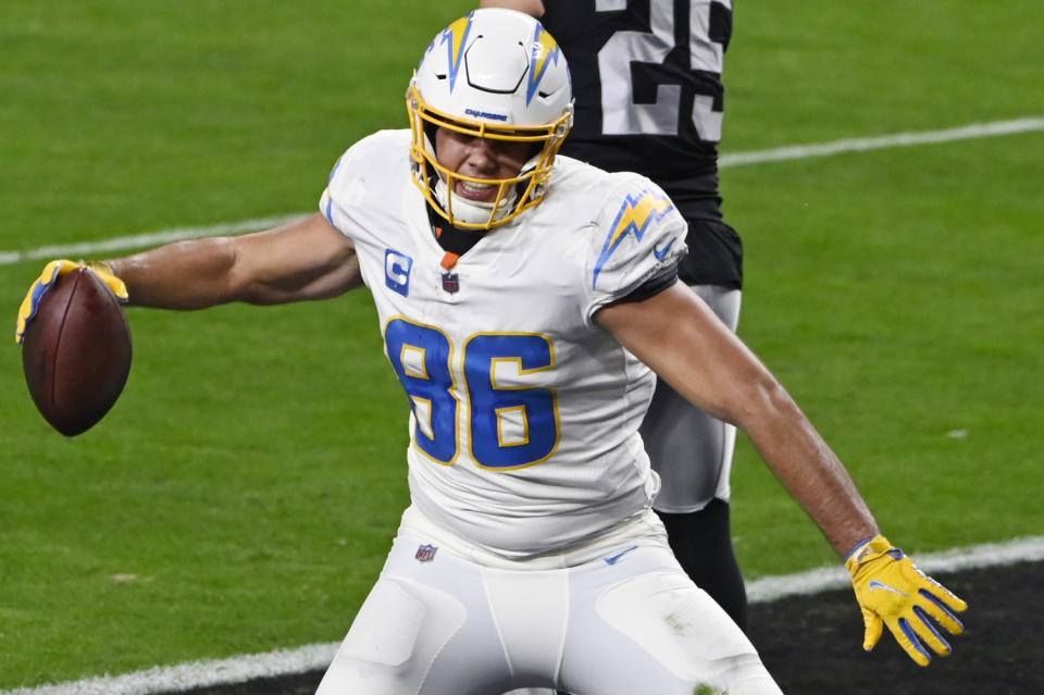 Chargers tight end Hunter Henry spikes the ball after scoring a touchdown.