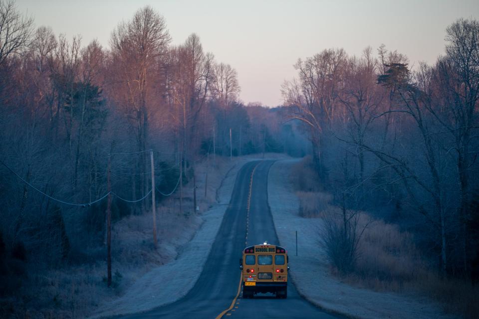 A school bus travels down the rural roads in Dawson Springs, Kentucky