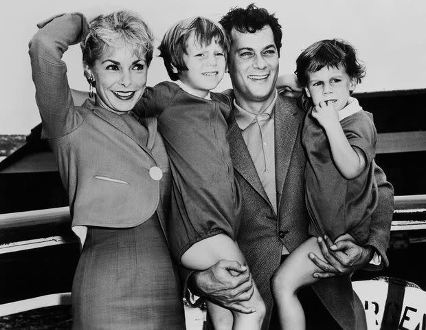 <p>Keystone-France/Gamma-Rapho/Getty</p> Janet Leigh and Tony Curtis with daughters Kelly and Jamie Lee