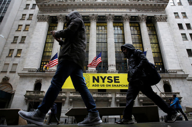 A Snapchat sign hangs on the facade of the New York Stock Exchange (NYSE) in New York City, U.S., January 24, 2017. REUTERS/Brendan McDermid