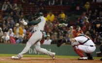 May 15, 2018; Boston, MA, USA; Oakland Athletics third baseman Matt Chapman (26) hits an 2-RBI double against the Boston Red Sox in the first inning at Fenway Park. Mandatory Credit: David Butler II-USA TODAY Sports