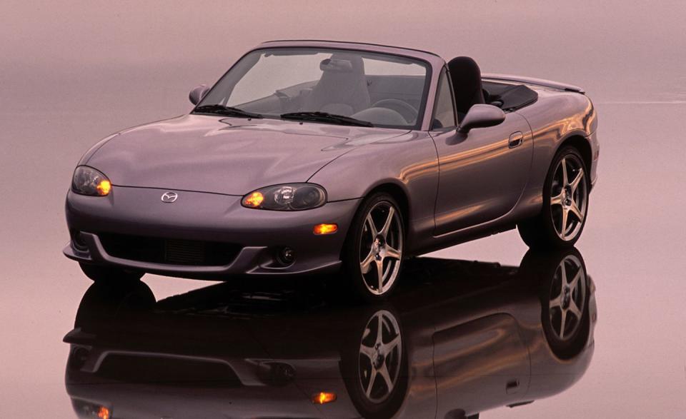 <p>For the first time, the Mazda MX-5 Miata gets forced induction from the factory. (Third parties for years had been offering turbocharging and supercharging kits for the Miata-as well as V-8 engine conversions.) Mazda's performance arm, Mazdaspeed, installs a turbocharged four-cylinder engine making 178 horsepower, a torque-sensing limited-slip differential, 17-inch Racing Hart wheels with performance tires, and a stiffer and lowered suspension. It is notably quicker than regular Miatas, reaching 60 mph in our testing in 6.7 seconds<br></p>