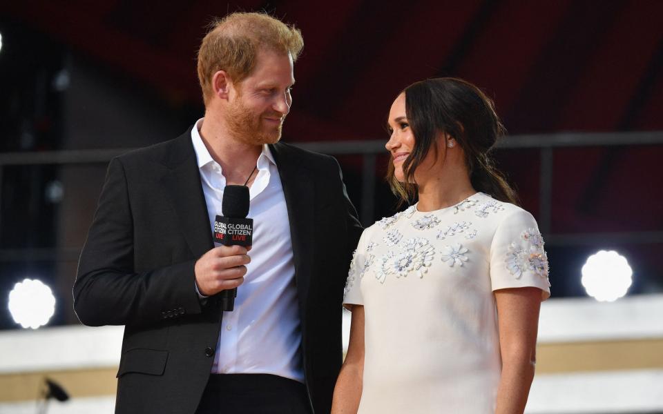 Meghan wore a white Valentino dress to present at Global Citizen Live - Wireimage