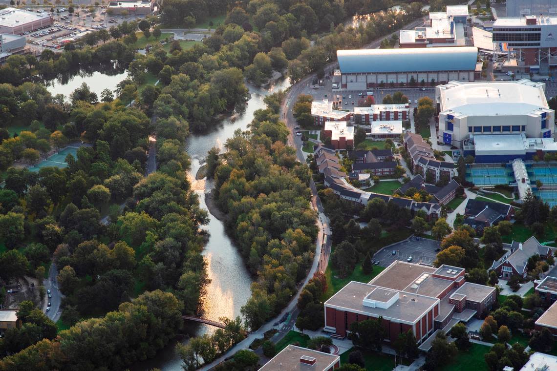 The Boise River winds past the Boise State University campus, seen from above, on Thursday, Sept. 2, 2021.