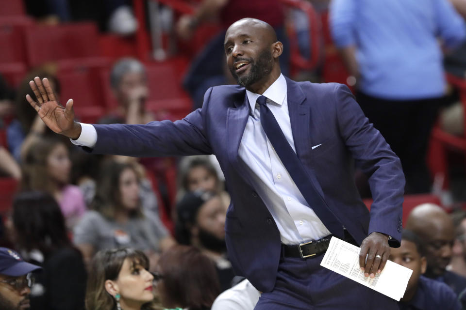 Atlanta Hawks' Lloyd Pierce watches during the first half of an NBA basketball game against the Miami Heat, Tuesday, Dec. 10, 2019, in Miami. (AP Photo/Lynne Sladky)