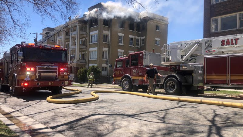 Salt Lake City firefighters battle an apartment fire in the Avenues neighborhood on Tuesday, April 13, 2023.