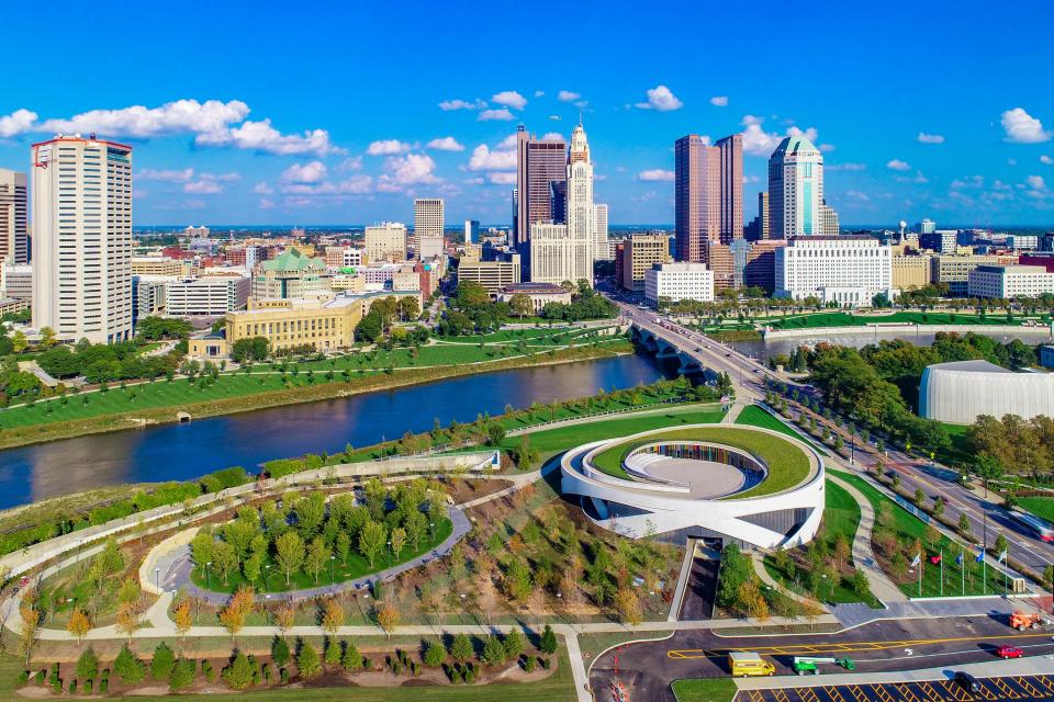 An aerial image shows the views of the river and nearby downtown skyscrapers. The entire property that houses the NVMM features some 251 trees from 21 different varieties.