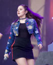 <p>We’re loving patches right now and so does Katy B. Check out this dreamy denim jacket that she was working on the main stage. <i>[Photo: Getty]</i></p>