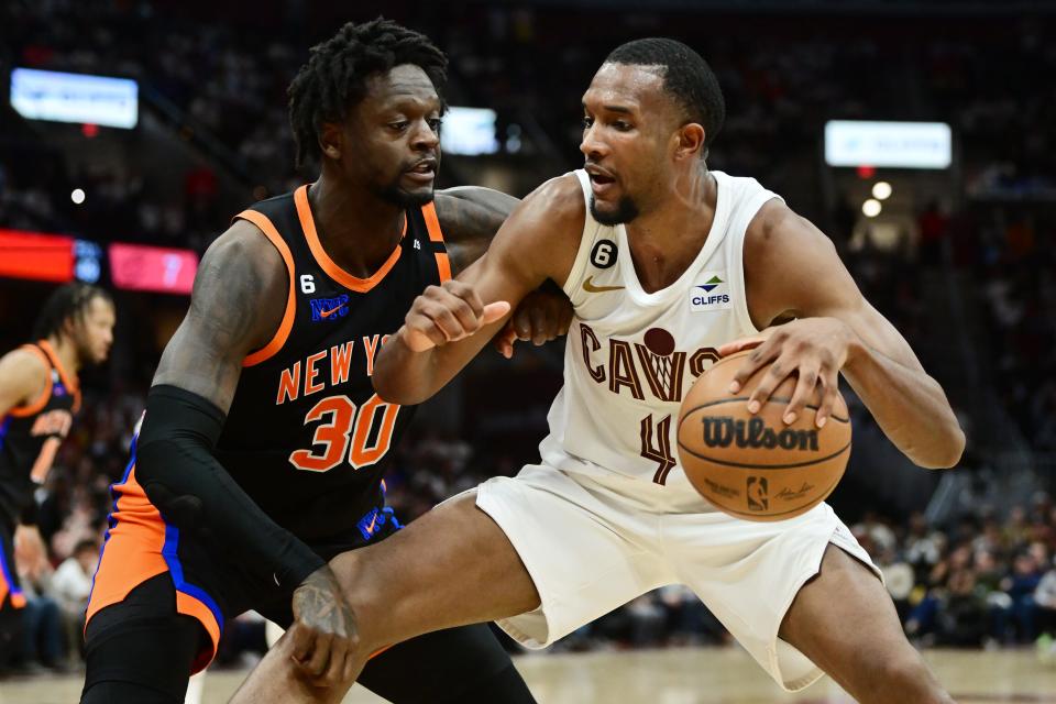 Knicks forward Julius Randle defends Cavaliers forward Evan Mobley during the second half of Game 2 of a first-round playoff series, Tuesday, April 18, 2023, in Cleveland.