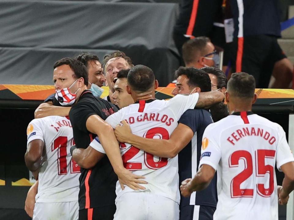 Sevilla players celebrate during the Europa League final against Inter Milan: Getty Images