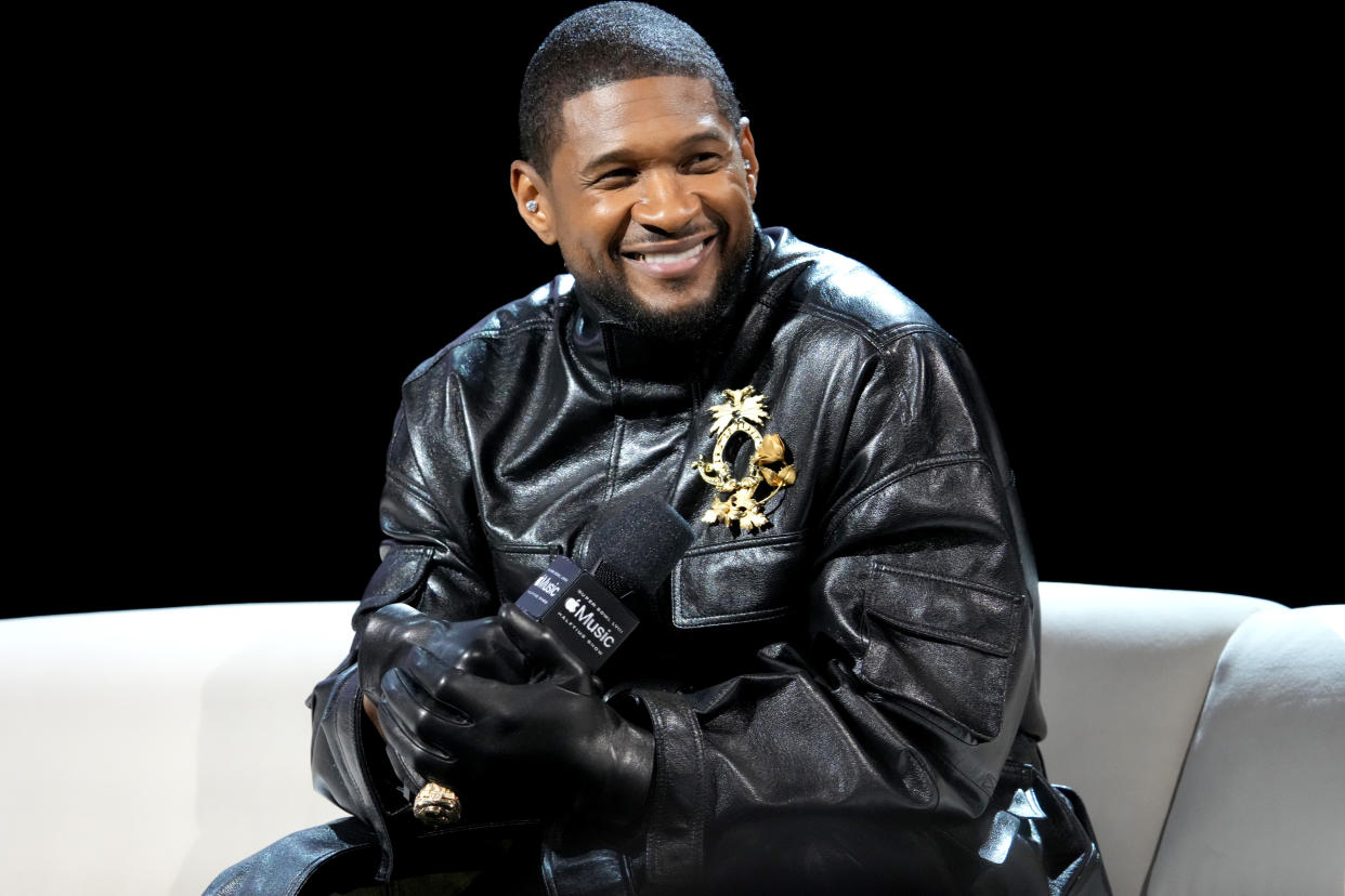 LAS VEGAS, NEVADA - FEBRUARY 08: Usher speaks onstage during the Super Bowl LVIII Pregame & Apple Music Super Bowl LVIII Halftime Show Press Conference at the Mandalay Bay Convention Center on February 08, 2024 in Las Vegas, Nevada. (Photo by Jeff Kravitz/FilmMagic)