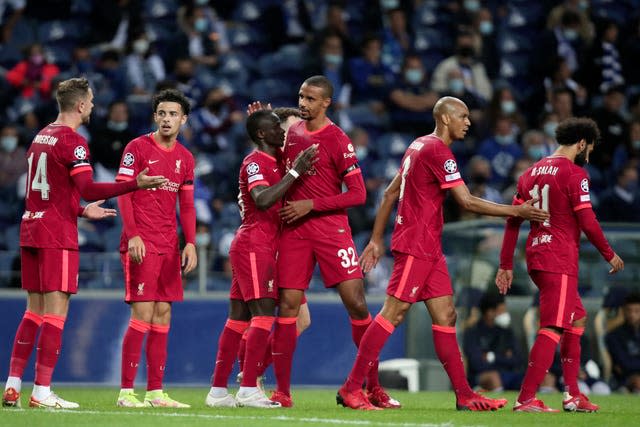 Sadio Mane (third left) celebrates scoring for Liverpool