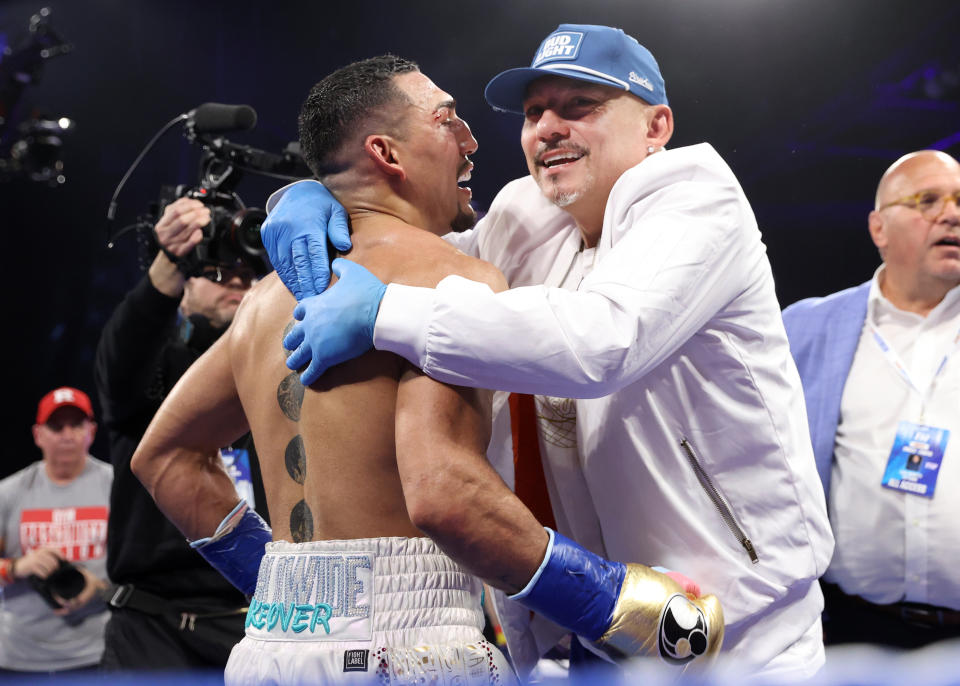 NEW YORK, NEW YORK - JUNE 10: Teofimo Lopez (L) celebrates with his dad Teofimo Lopez Sr (R) after defeating Josh Taylor, during his WBO junior welterweight championship fight at The Hulu Theater at Madison Square Garden on June 10, 2023 in New York City. (Photo by Mikey Williams/Top Rank Inc via Getty Images)