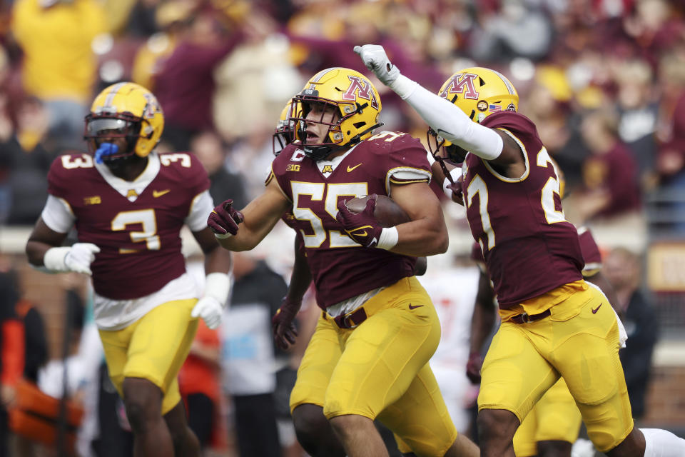 Minnesota linebacker Mariano Sori-Marin (55) celebrates with teammates after intercepting the ball against Bowling Green during an NCAA college football game Saturday, Sept. 25, 2021, in Minneapolis. (AP Photo/Stacy Bengs)