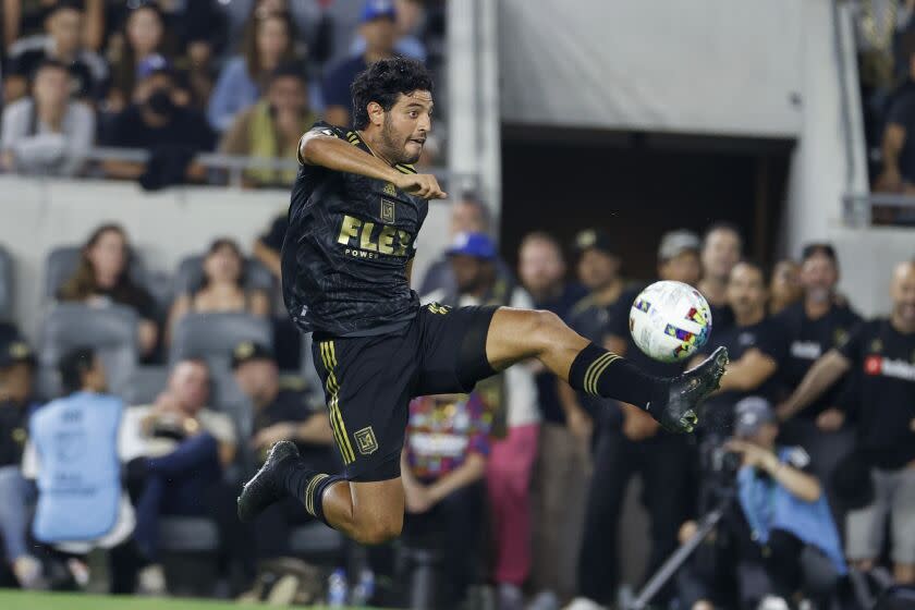 Los Angeles FC forward Carlos Vela (10) controls the ball during the second half of the team's MLS soccer match against FC Dallas in Los Angeles, Wednesday, June 29, 2022. Los Angeles won 3-1. (AP Photo/Ringo H.W. Chiu)