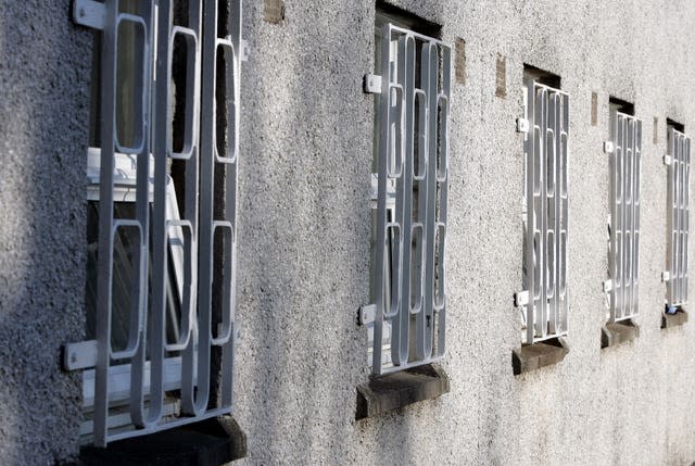 Barred windows at a prison (Andrew Milligan/PA)