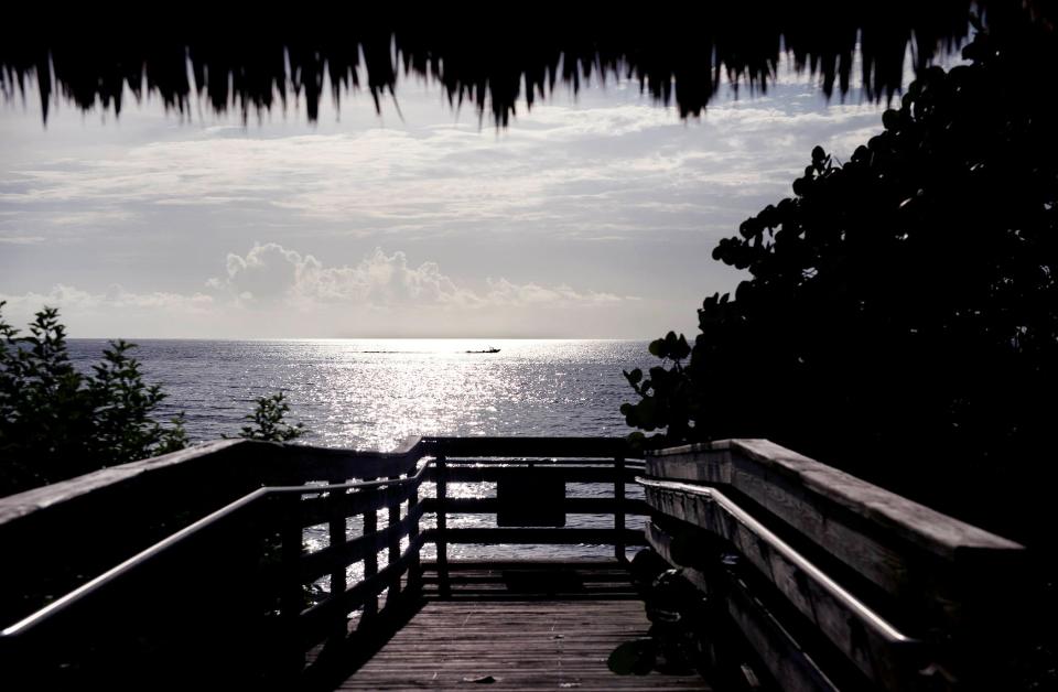 A boat heads south off the shore of the beach Aug. 16 at Phipps Ocean Park. The Preservation Foundation of Palm Beach's Phipps Ocean Park Dinner is slated for Nov. 28.