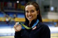 Natalie Coughlin of the United States poses with her bronze medal after the women's 50m freestyle final the 2015 Pan Am Games at Pan Am Aquatics UTS Centre and Field House. Erich Schlegel-USA TODAY Sports