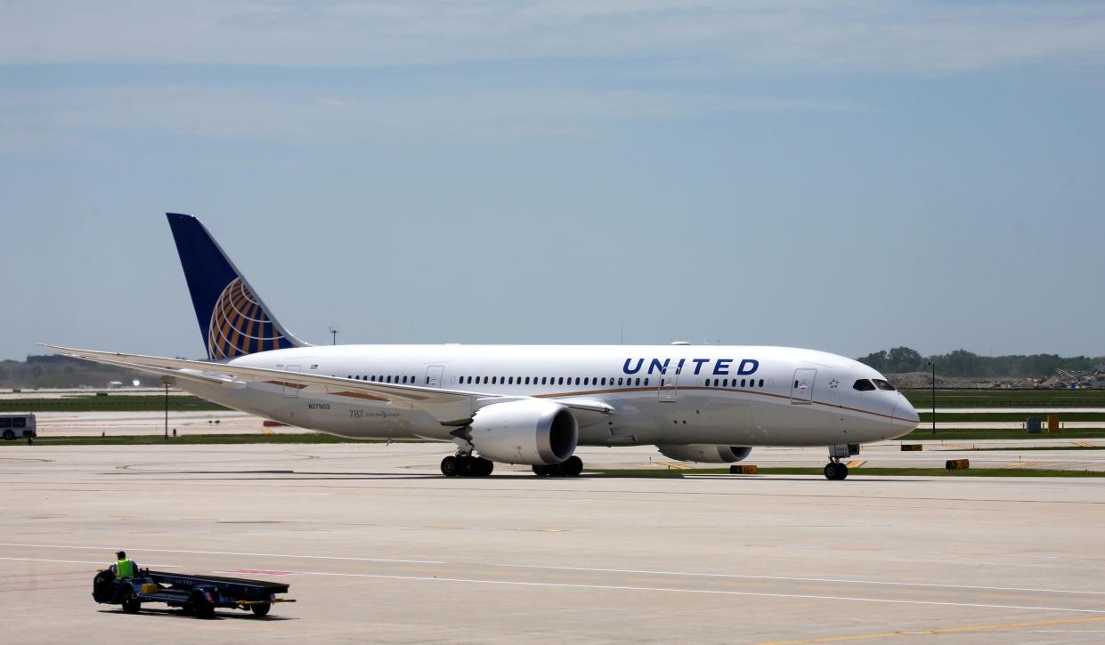 United Airlines Flight # 1 a Boeing 787 Dreamliner aircraft from Houston, Texas, taxis to the gate after landing at Chicago's O'Hare International Airport