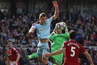 Britain Football Soccer - Middlesbrough v Burnley - Premier League - The Riverside Stadium - 8/4/17 Middlesbrough's Victor Valdes catches the ball from Burnley's Sam Vokes Action Images via Reuters / Craig Brough Livepic