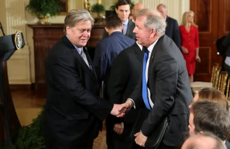 Britain's ambassador to U.S. Darroch is greeted at Trump-May joint news conference at the White House in Washington