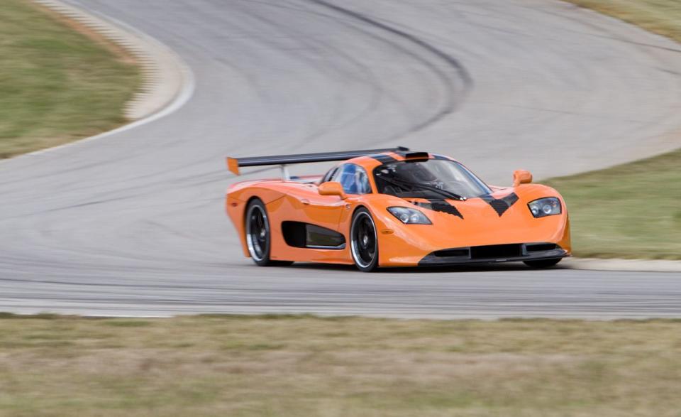 <p>Horsepower: 550; Weight: 2501 lb; Price as tested: $393,900<br><br></p><p>Most cars come with a factory warranty, but the Mosler seemingly came with its own factory of handlers. And it needed it, too, due to several mechanical issues. The Photon is an evolution of the MT900S. It has the same mildly tuned 550-hp, mid-mounted Corvette LS7 engine, now hooked up to an exotic sequential six-speed Hewland transmission. This and other changes cut 83 pounds from the Mosler’s weight. Mosler also reduced the rear track by 1.2 inches and fitted narrower 315-section tires in place of 345s. <span>READ MORE ››</span></p>