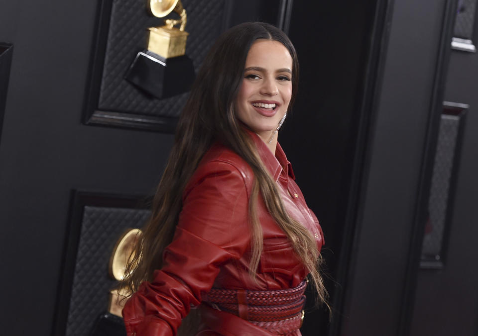 FILE - Rosalia arrives at the 62nd annual Grammy Awards on Jan. 26, 2020, in Los Angeles. The Spanish singer made history when she won album of the year at last year's Latin Grammys and she continued her winning streak Thursday, Nov. 19, 2020, picking up three more honors during the pre-ceremony ahead of the Latin Grammys awards. (Photo by Jordan Strauss/Invision/AP, File)