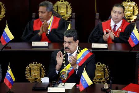 Venezuela's President Nicolas Maduro attends a ceremony to mark the opening of the judicial year at the Supreme Court of Justice (TSJ) in Caracas, Venezuela February 14, 2018. REUTERS/Marco Bello