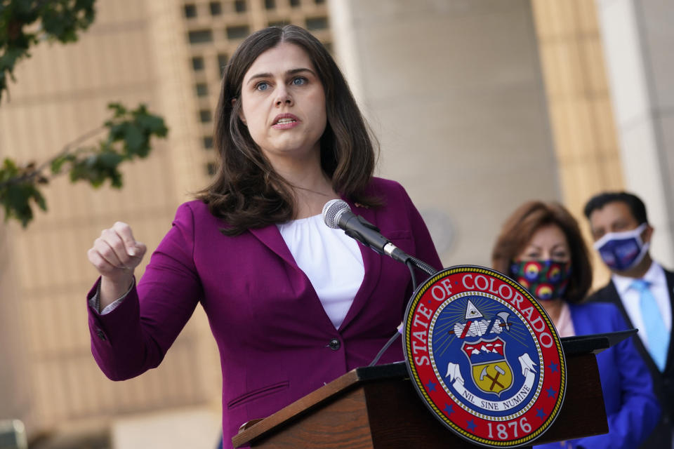 FILE - Colorado Secretary of State Jena Griswold speaks during a news conference in Denver on Oct. 15, 2020. This week’s gripping testimony about threats to election officials by former President Donald Trump and his followers had a rapt audience outside Washington -- secretaries of state and election clerks across the country who said the stories could very well have been their own. (AP Photo/David Zalubowski, File)