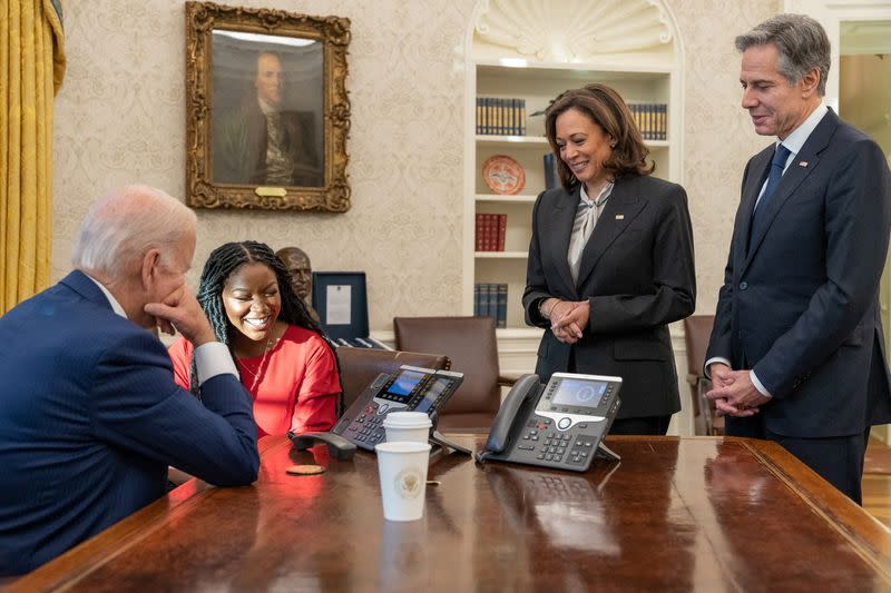 U.S. President Joe Biden embraces Brittney Griner's wife Cherelle Griner at the White House in Washington