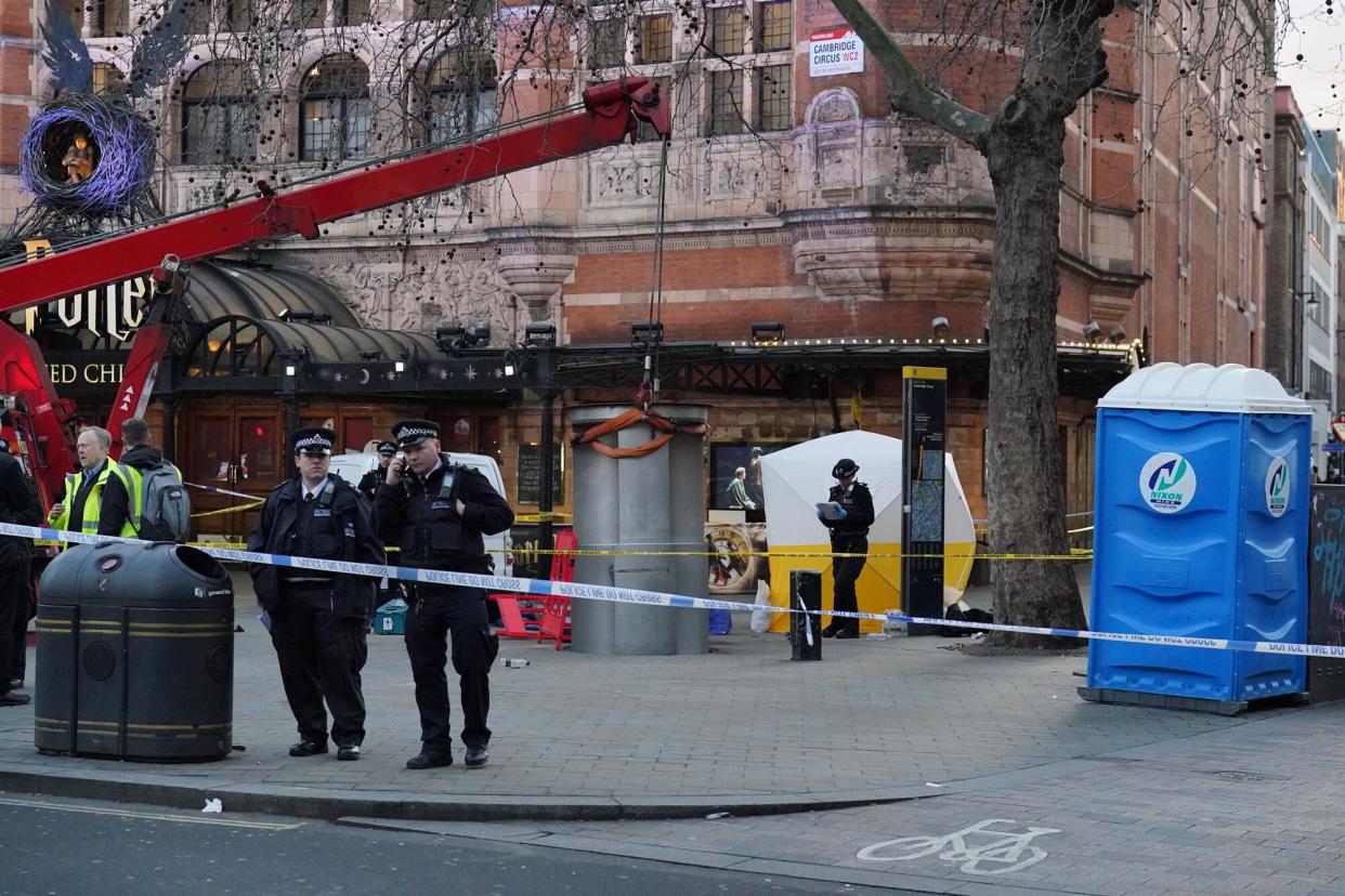 January 27, 2023, LONDON, UK: A police tent is erected at Cambridge Circus on the junction between Shaftesbury Avenue and Charing Cross Road in London, after a man died after being crushed by a telescopic urinal. Fire crews said the man has been freed and is in the care of the London Ambulance Service. Roads in the area have been closed.