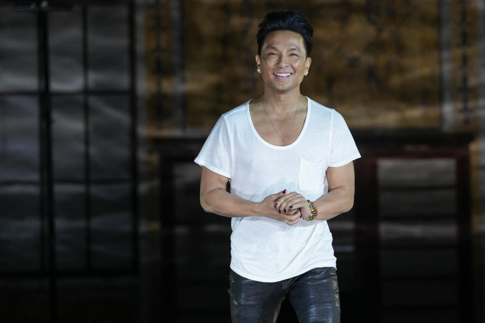 Designer Prabal Gurung acknowledges the audience applause after his collection was modeled during Fashion Week, Friday, Feb. 10, 2023, in New York. (AP Photo/Mary Altaffer)