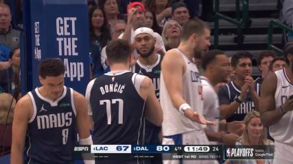 Luka Doncic scores and draws the foul