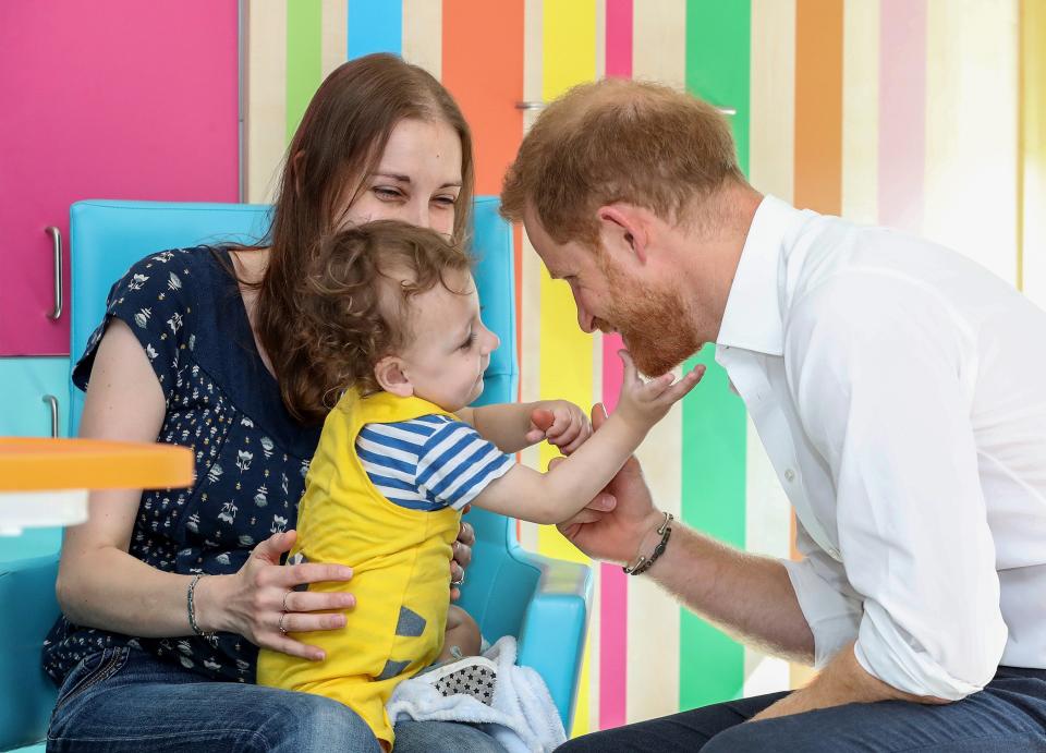 Noah Nicholson, almost 2 years old, was fascinated by the prince’s orange beard. Noah, who has spent most of his life in hospital after being born at 27 weeks, gave the beard a tug when Harry leaned in close to him. “Have you never seen a beard before?” said Harry.