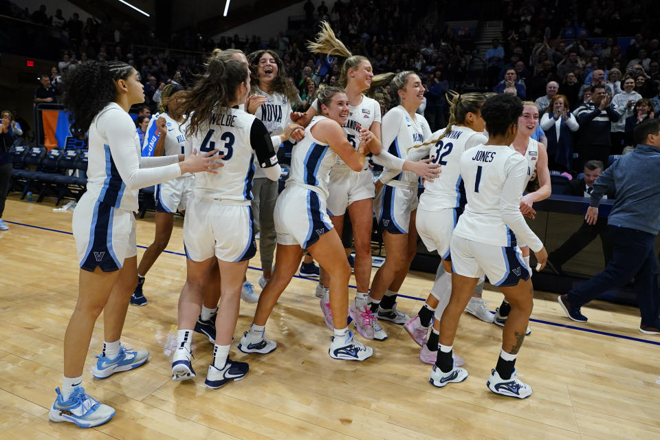 Villanova players celebrate after winning a second-round college basketball game against Florida Gulf Coast in the NCAA Tournament, Monday, March 20, 2023, in Villanova, Pa. (AP Photo/Matt Rourke)