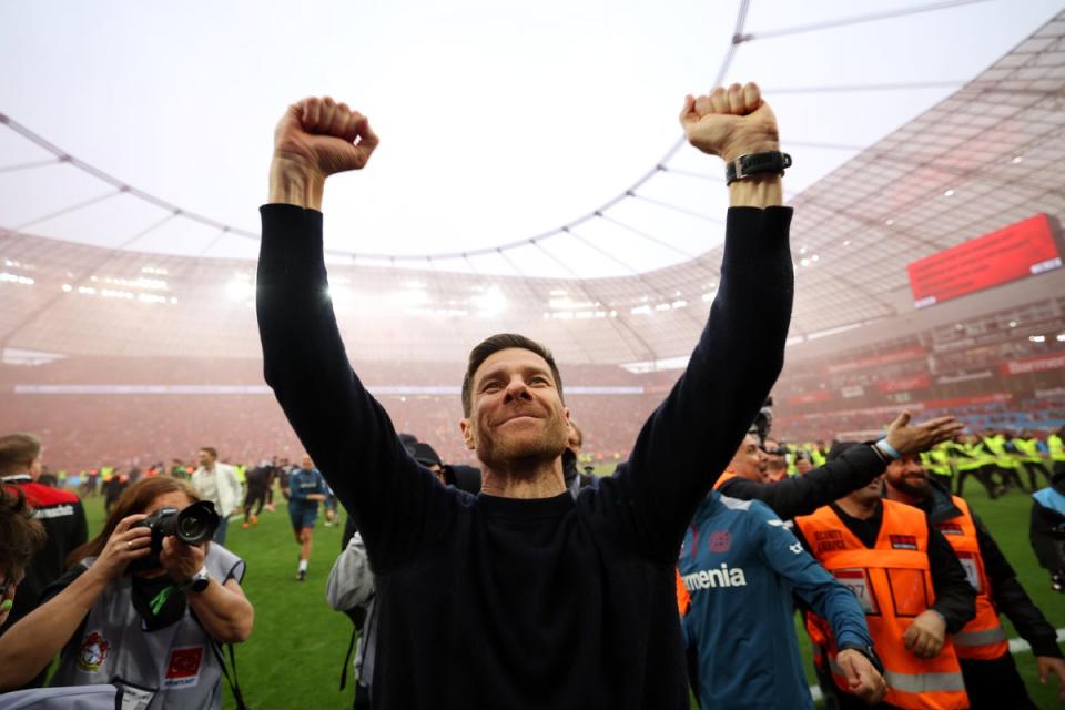 Xabi Alonso celebrates as Bayer Leverkusen were crowned Bundesliga champions  (Getty Images)