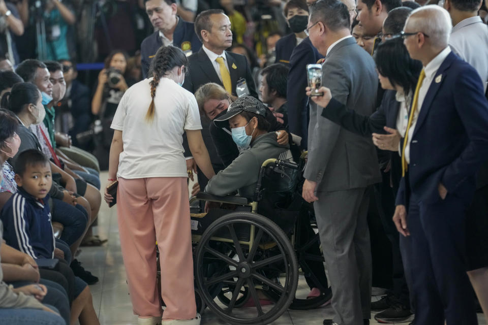 An injured Thai overseas worker, on wheelchair, who was evacuated from Israel, arrives at Suvarnabhumi International Airport, in Samut Prakarn Province, Thailand, Thursday, Oct. 12, 2023. The first Thai nationals evacuated since the latest war between Israel and Hamas returned home Thursday. (AP Photo/Sakchai Lalit)